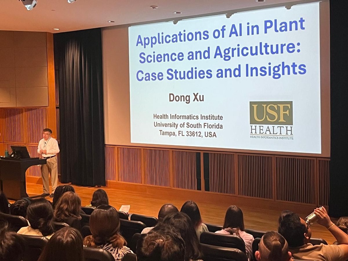Dr. Dong Xu presenting his keynote, "Applications of AI in Plant Science and Agriculture: Case Studies and Insights," at the 2026 Midwest ASPB-IPG Symposium.